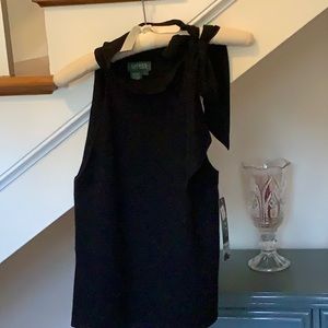 Chic black fold over sleeveless sweater with bow